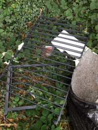 fly tipping at Aston Bridge - old railings and carpet
