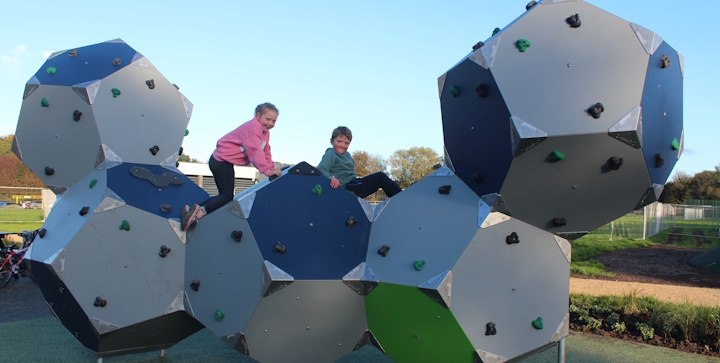 Children climbing on play equipment at Westbridge Park