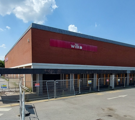 Former Wilko's store with fence around